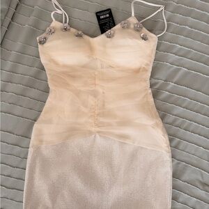 Elegant Cream Dress with Floral Accents